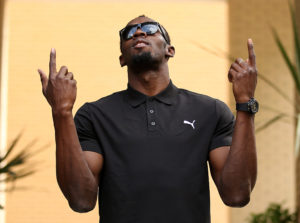 Usain Bolt poses ahead of his press conference at the Grange Tower Bridge Hotel, London.
