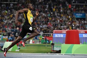 Jamaica's Usain Bolt competes in the men's 200m Final during the athletics event at the Rio 2016 Olympic Games at the Olympic Stadium in Rio de Janeiro on August 18, 2016.   / AFP / Jeff PACHOUD        (Photo credit should read JEFF PACHOUD/AFP/Getty Images)