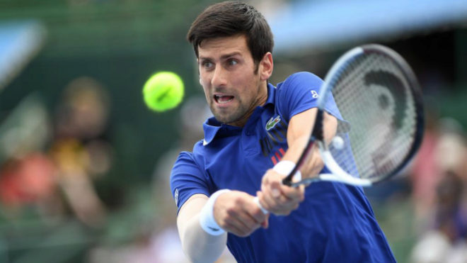 Djokovic returns from elbow injury with Kooyong win over Thiem