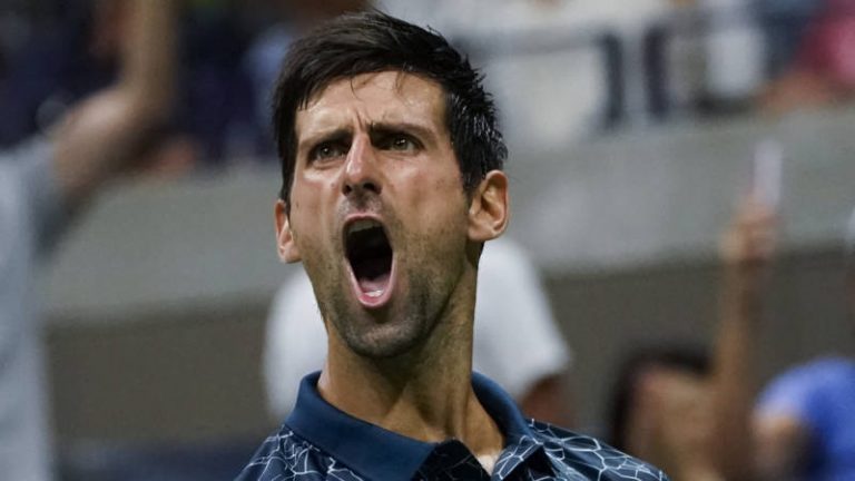 Djokovic doet oude tijden herleven en wint derde US Open