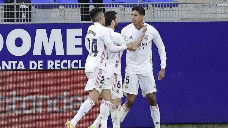 Productieve bui Varane helpt Real aan benauwde zege